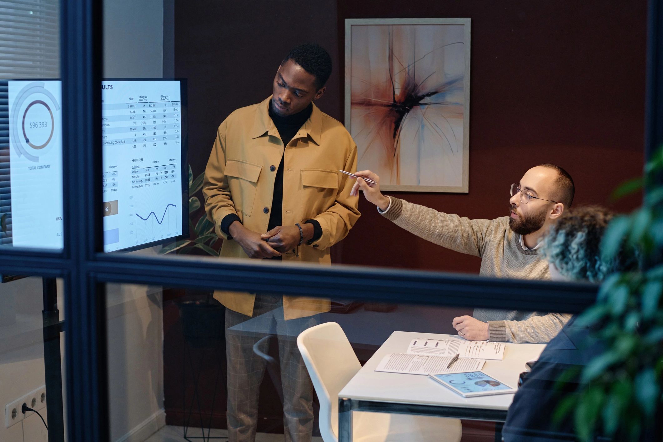 Team analyzing data together in a conference room