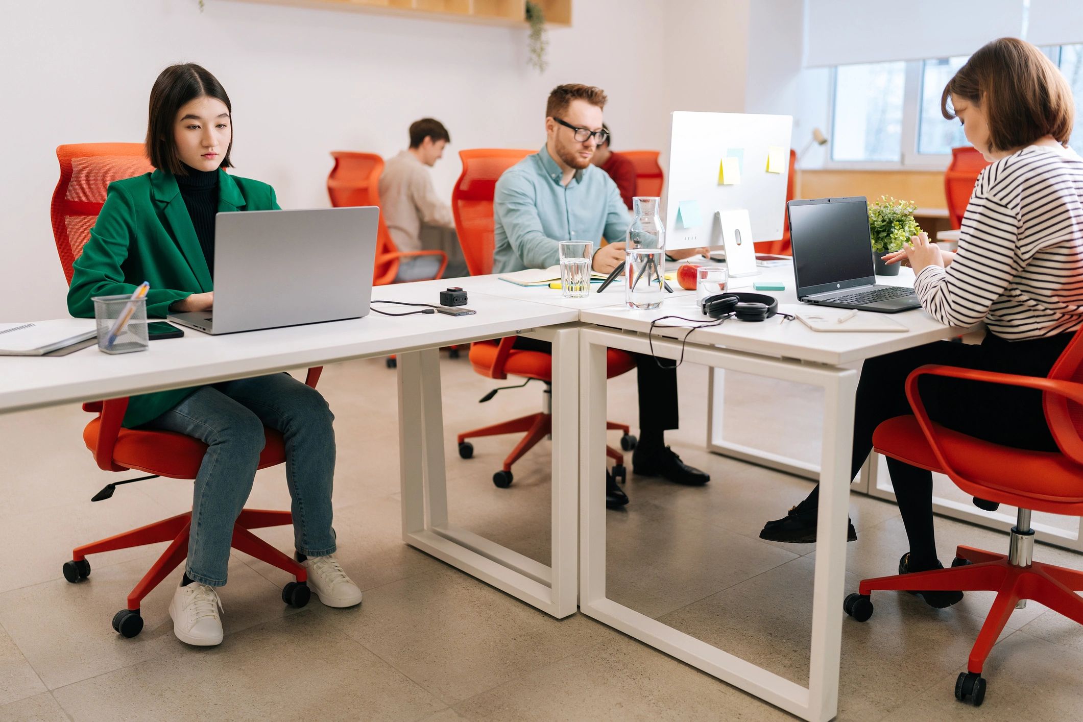 Technology professionals collaborating at a coworking workplace